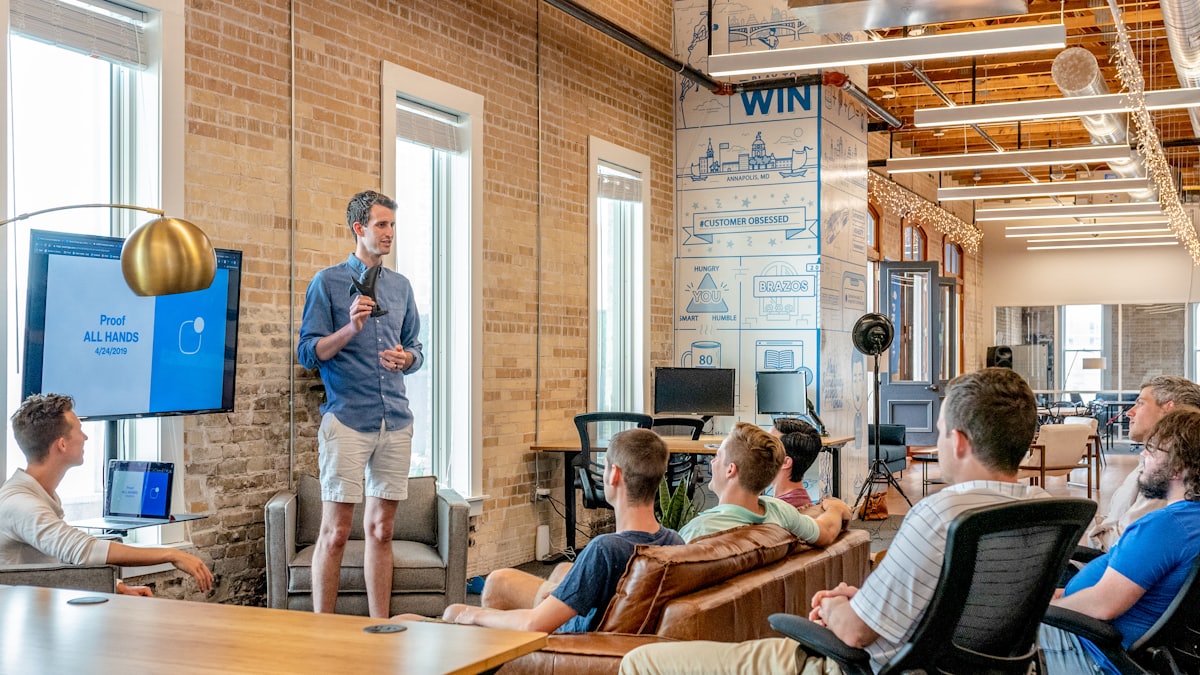 A relaxed conversation between a consultant and a small-business owner